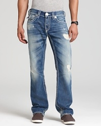 Major distressing and fading plus whiskering on the front and back equals a timeworn, super-styled authentic pair of classic denim from True Religion, perfectly attuned to your rugged, been-through-it-all vibe.