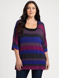 Classic stripes in updated hues give this relaxed-fit tunic instant appeal. You will be a fan of the three-quarter sleeves offering stylish arm coverage.ScoopneckDolman sleevesAllover printPull-on styleAbout 30 from shoulder to hemRayonMachine washMade in USA