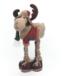 One well-dressed moose, this cuddly charmer from Napco sports a faux fur-trimmed jacket, flap hat and booties. Long legs give him a terrific view over a bustling holiday home.