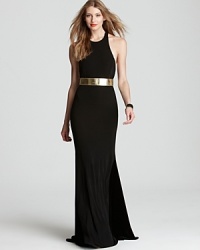 In a minimalistic silhouette, ABS by Allen Schwartz's tank gown lends a modern look with a dramatic T back. A metallic belt subtly accessorizes.