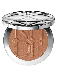 As featured in our Beauty Event in Amber. This new core bronzer is delivered in a sleek, round, silver cannage compact. It is accompanied by a mini kabuki brush that warms up the skin and creates a natural, sunkissed glow. Featuring new mineral prism technology, energizing water, and a light transparent formula to create an energized, glowing complexion. 