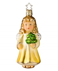 Bring all the warmth and wonder of the holidays to your home with this golden glass ornament from Inge-Glas. Crafted in Germany of the highest-grade, mouth-blown glass and hand-painted for exquisite detail, it truly is a timeless holiday heirloom.