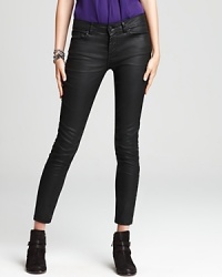 Crafted in a stretch denim twill, these sleek dark wash Joie jeans elongate the legs for a slimmer appearance in a classic five-pocket silhouette.