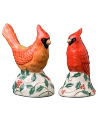 Perched on a classic holly pattern, the cardinal salt and pepper shakers make a festive addition to Pfaltzgraff Winterberry dinnerware and a charming gift.