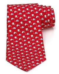 A silk tie adds distinction and flair to your formal presentation. With a repeating pattern of running elephants, you'll also punch up your attire with a bit of wit.