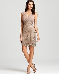 Steal attention in this impeccably detailed dress from Sue Wong, featuring intricate beading throughout.