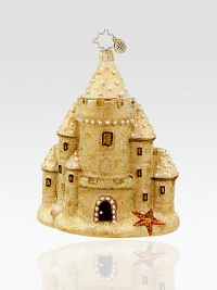 Add seaside charm to the tree with this goldtone sandcastle ornament in mouthblown glittered glass.Mouthblown, handpainted glass 5 high Made in Poland