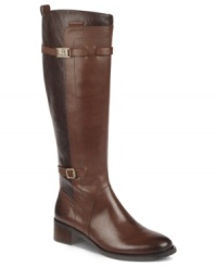 Different color leathers add amazing contrast to the shaft of Etienne Aigner's Cotton Riding boots. Slim buckled straps with designer logo detail wrap around the top and bottom of the shaft.