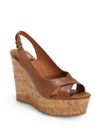 THE LOOKCrisscross leather upperAdjustable slingback strapPadded insoleCork wedge, 5 (125mm)Cork platform, 1½ (40mm)Compares to a 3½ heel (90mm)THE MATERIALLeather upperLeather liningRubber soleORIGINImported