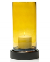 Give your home a golden touch. Sunny yellow glass amplifies the warm glow from inside the Solaris hurricane candle holder from Mikasa.