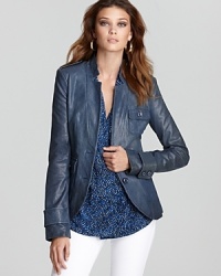 Indulge in the luxury of luxe leather and opt for this Rachel Zoe notch collar jacket. Three patch pockets lend a unique touch to the jewel-toned silhouette, perfect for 24-hours of city cool.