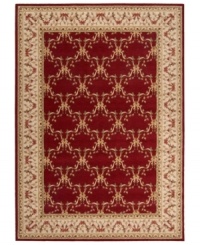 Outfit your home in old-world elegance. A wonderfully ornamental European-inspired motif with vines and blossoms gives this hand-carved wool rug a look of fine-tuned beauty. Soft and inviting in vibrant burgundy, the rug is an inspired choice for living areas and dining rooms.