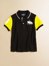 It's game time in this athletic jersey-inspired cotton mesh polo, featuring Ralph Lauren's iconic pony at the chest and twill 3 embellishments.Ribbed polo collarShort sleevesButton-frontEven-vented hemCottonMachine washImported Please note: Number of buttons may vary depending on size ordered. 