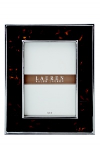 The alluring beauty of multi-faceted Tortoise shell finish presents a warm accent to clean stainless steel in this refined picture frame from Lauren by Ralph Lauren.