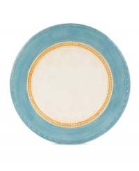 Rope accents and a band of cool blue make these dinner plates stand out amid the vibrant patterns of Carissa Paisley dinnerware from Fitz and Floyd.