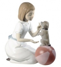 Nao by Lladro Collectible Porcelain Figurine: LEARNING NEW TRICKS - 7 3/4 tall - a girl training her puppy dog.....very cute!